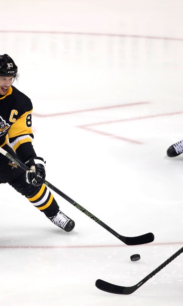 Crosby collects 4 points in return, Penguins rip Wild 7-3